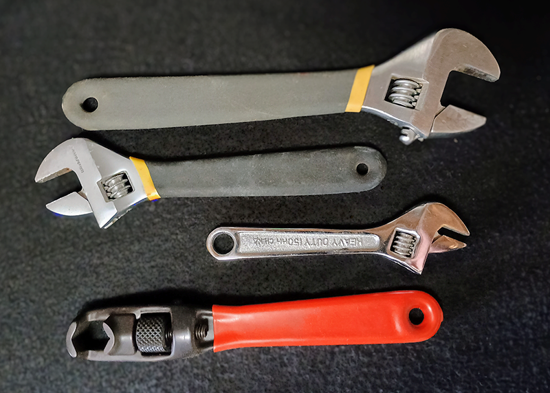 Three adjustable wrenches