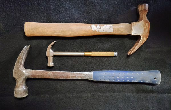 Three styles of claw hammer