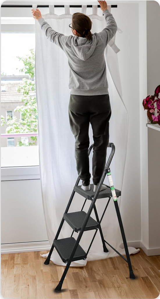 Hanging curtain while using step ladder